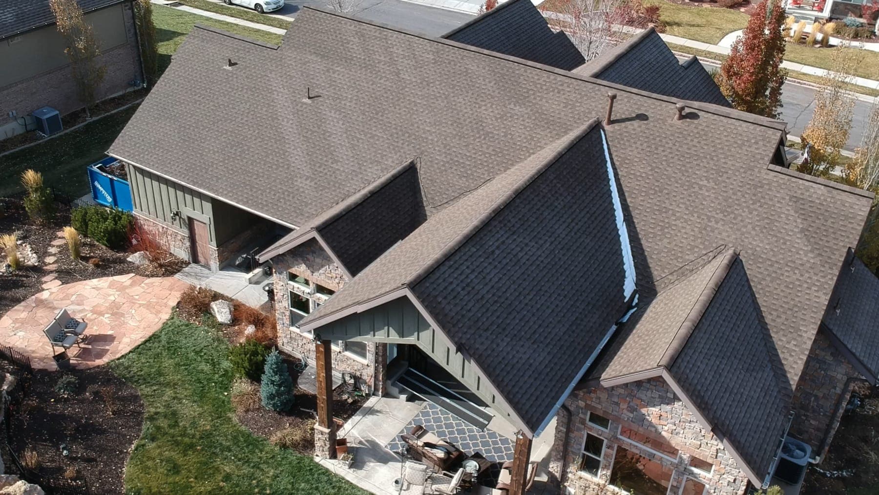 Aerial view of a completed Legacy Roofing asphalt shingle roof on a Utah home