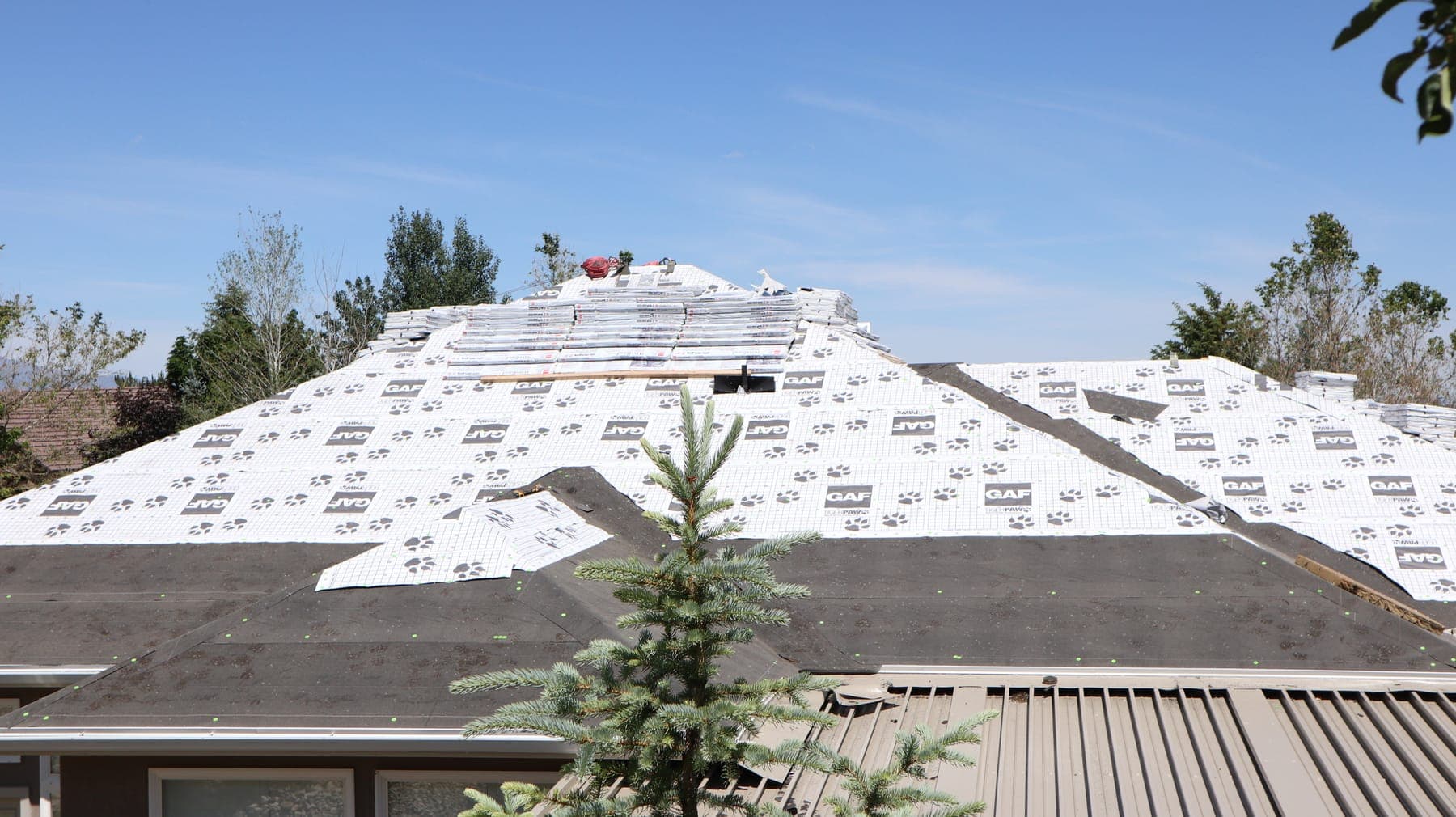 New roof underlayment installed on a Utah home during winter storm repairs